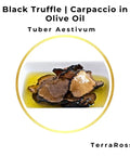 Black Truffle Carpaccio in Olive Oil showcasing fresh black truffle slices